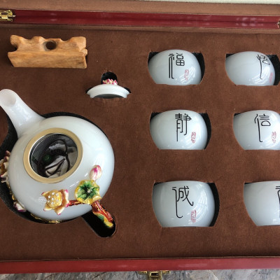 Bộ ấm trà chạm hoa sen đá bạch ngọc